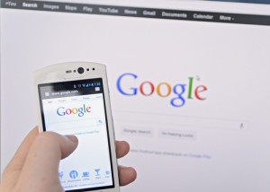 a smartphone and computer running google search